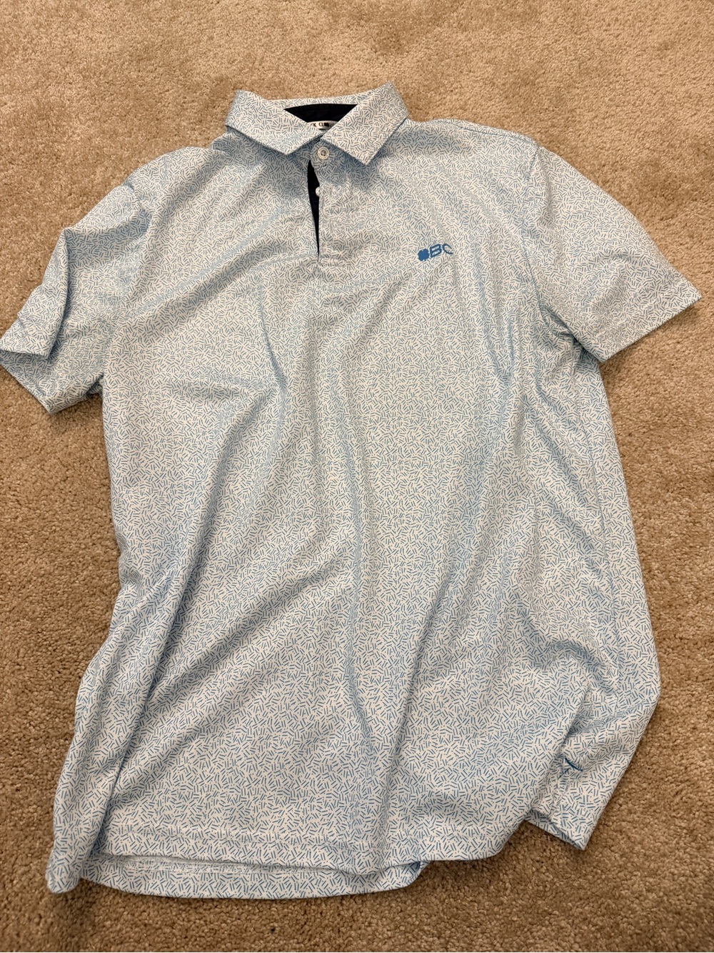 Light Blue Printed Men's Polo Shirt with Subtle Logo